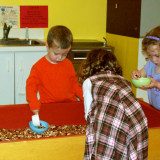 Children playing in sensory bin