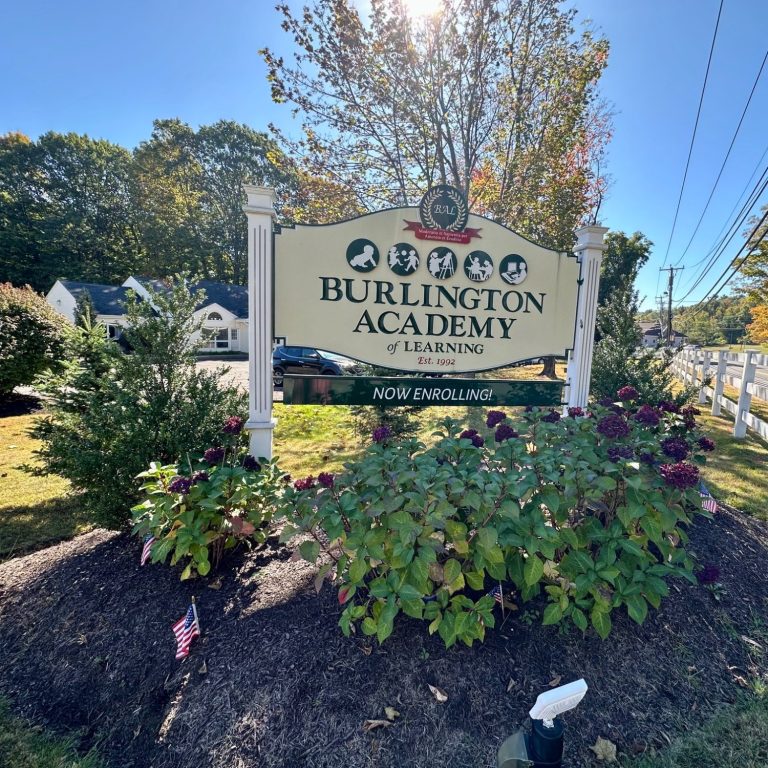 Burlington Academy Sign in garden