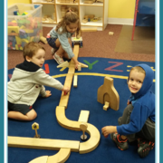 Children playing with train set