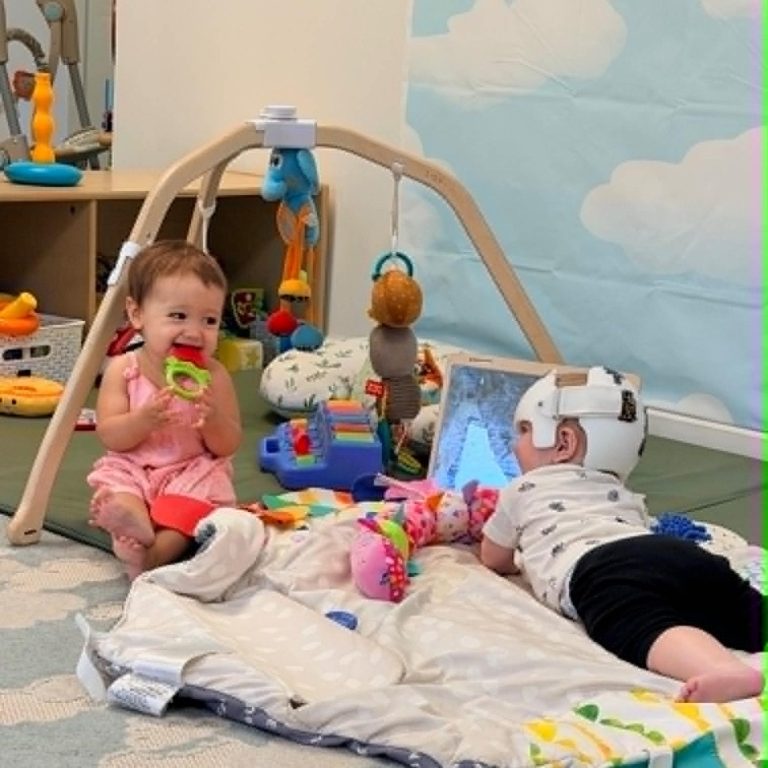 Babies playing with toys